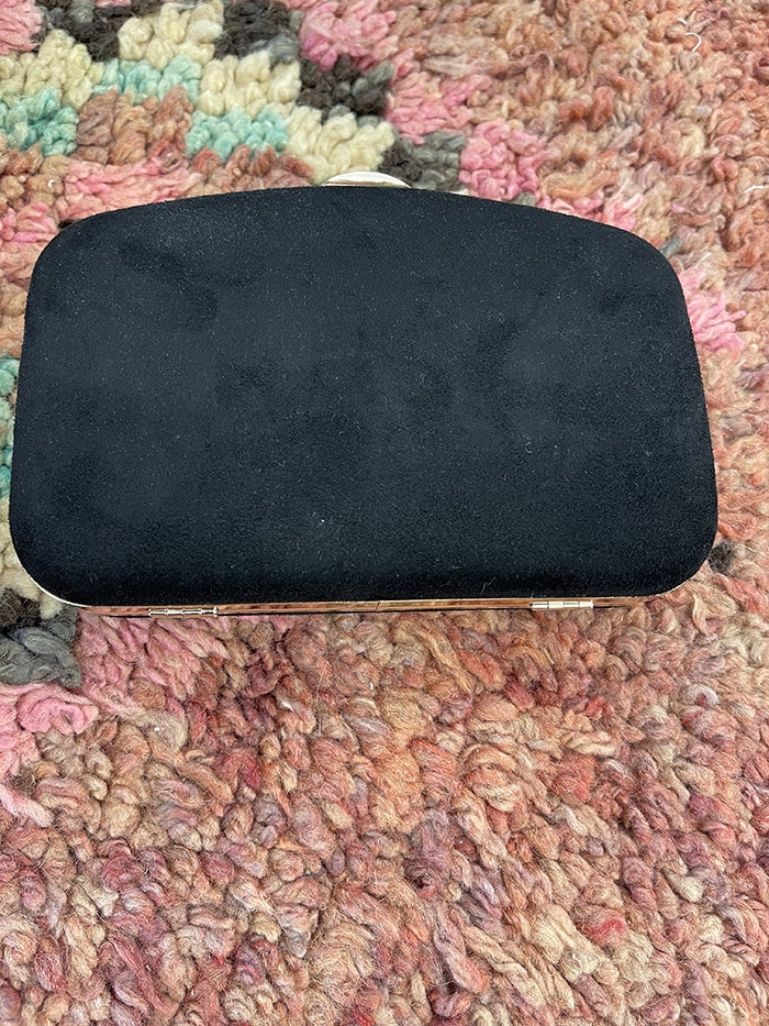 Black and gold clutch bag